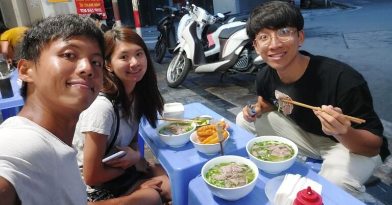 Regulus and his travel buddies having pho at Honai street