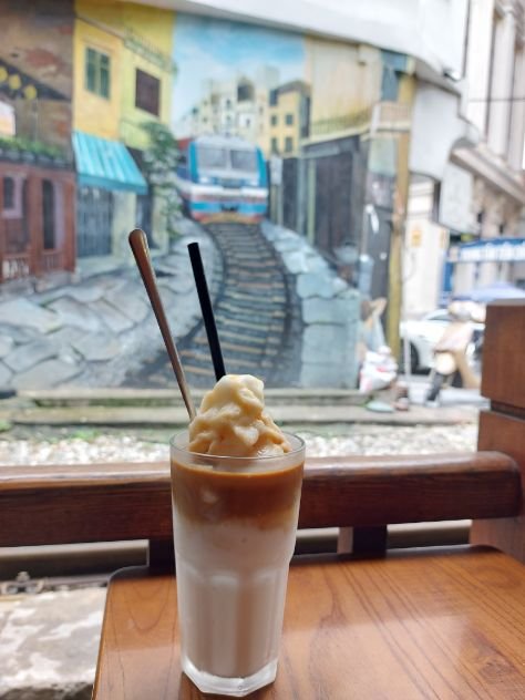 Cà Phê Cốt (Vietnamese Coconut Coffee) at train street