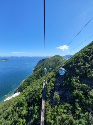 Cable car view of ocean park hk taking photo from inside to the landscape outside