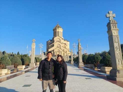 Photos in front of Holy Trinity Cathedral of Tibilis
