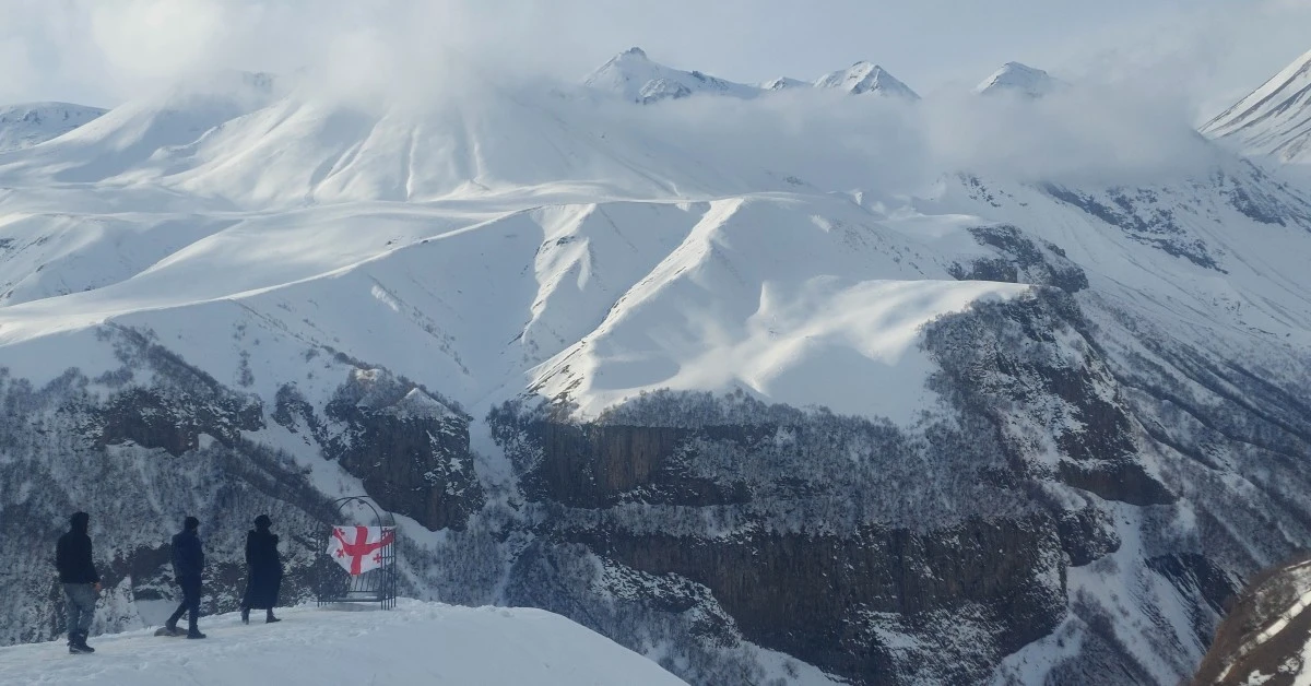 Feature-Page-Why-Travel-To-Caucasus with snow mountain scene