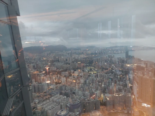 Day view from 103 cafe a photo of skycrapers in Hong Kong from the top