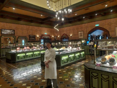 Semi buffet dinning hall with a waitress in the middle