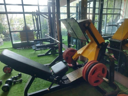 A weight training machine at Indo Service Apartment