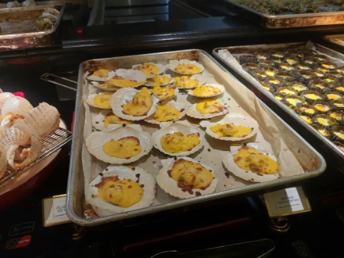 Baked scallop with cheese