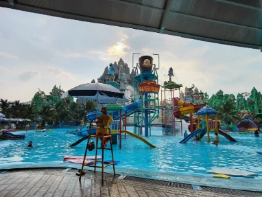 Kid pool with water slides at central area