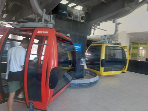 Taking cable car to the Ho May Park