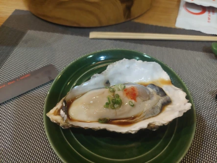 Very large Japanese oyster for less than 2 USD
