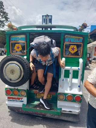 Getting down from the Jeepny