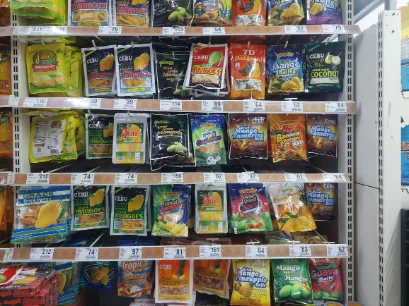 Buying souvenir at mall's super market