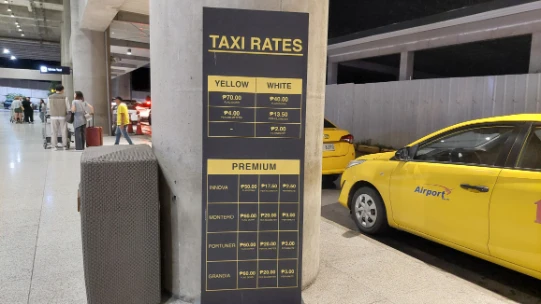 Don't mix up with the taxi stand before the grab pick-up point