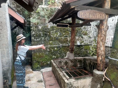 Making a wish in the old well in the fortress