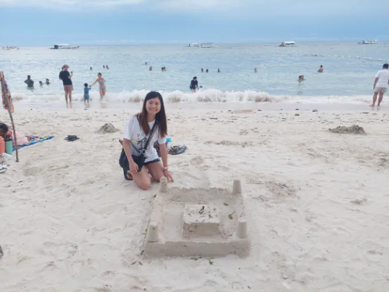 Playing sand on Alona beach