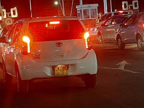 Taking a photo of the car plate before security check