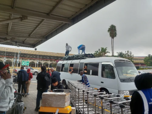 The pick point is just at the shelter opposite to the airport