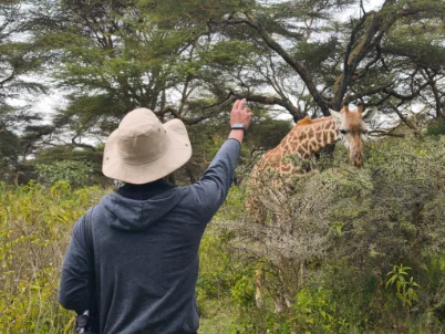 Pretending to feed the Giraffe