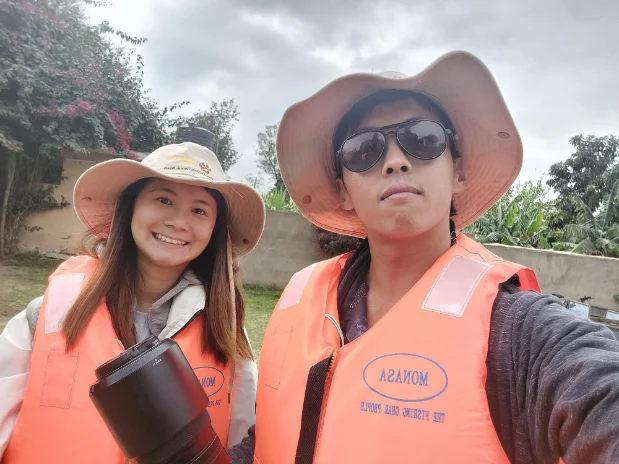Putting on life vest for the boat ride