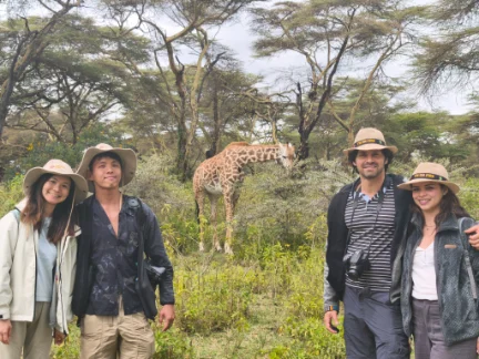 Taking photo with Giraffe at the private sanctuary