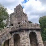 Stone tower and arches at Quinta da Regaleira
